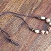 wooden beads on adjustable suede necklace - SOLD